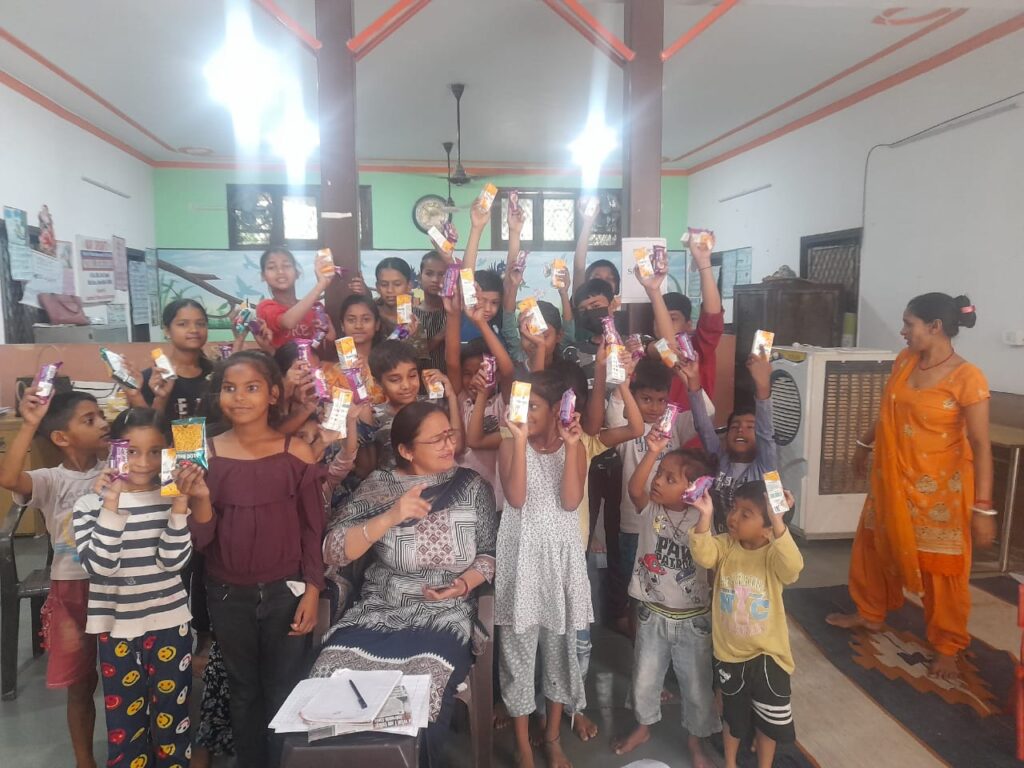 Distributed Frooti, Biscuits and Namkeen Packets in Navshrishti at Nebsarai on 24th May 2023​